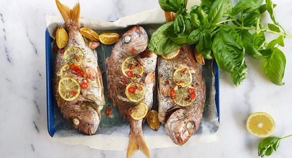 Whole snapper fish recipe with Greek olive oil by gourmet grocer Grecian Purveyor. Buy the best Greek products online.