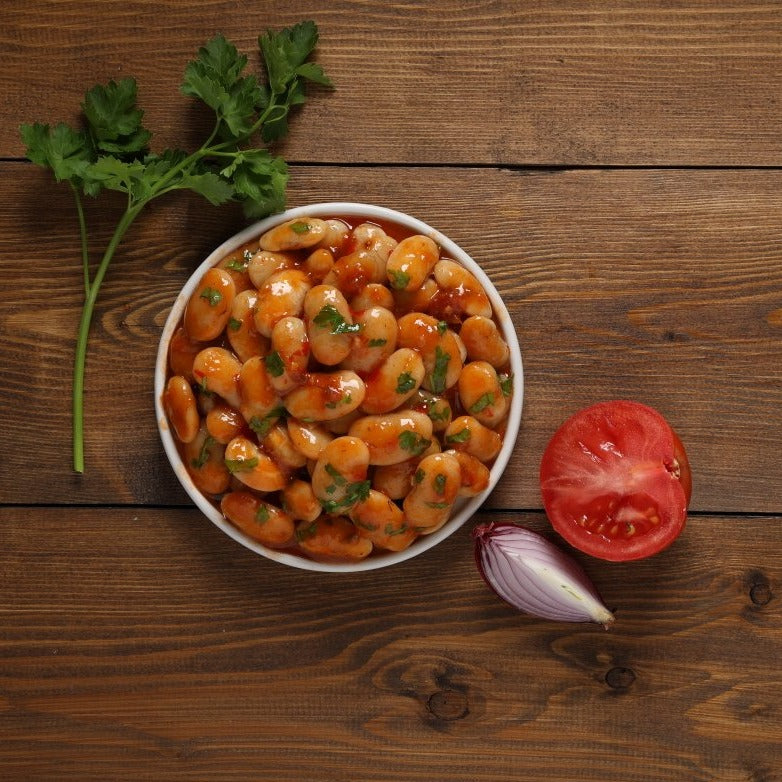 Greek gigantes, giant beans in rich tomato sauce and ready to eat vegan meal. Buy now in Sydney, Melbourne, Adelaide, Brisbane and Perth for free delivery in Australia.