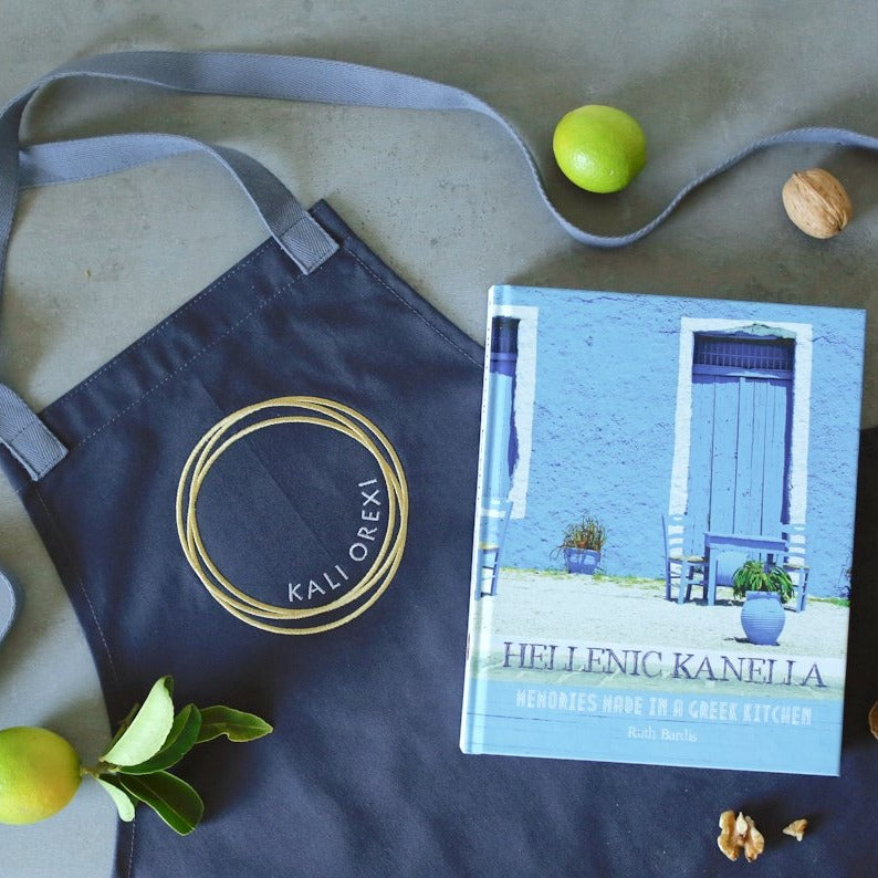 A perfect gourmet gift for foodies & ideal for dads who love to cook! Ruth Bardis' author signed multi-awarded book Hellenic Kanella, Memories Made in a Greek Kitchen, and Kali Orexi's stylish denim "style" apron together will make anyone love cooking. Buy online for delivery anywhere in Australia by Grecian Purveyor